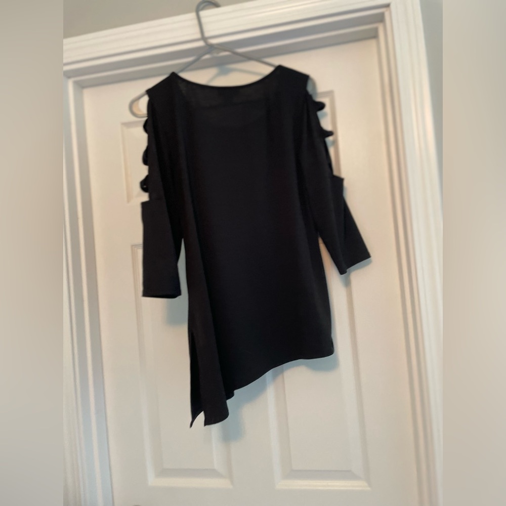 Wore a couple times. Super cute top